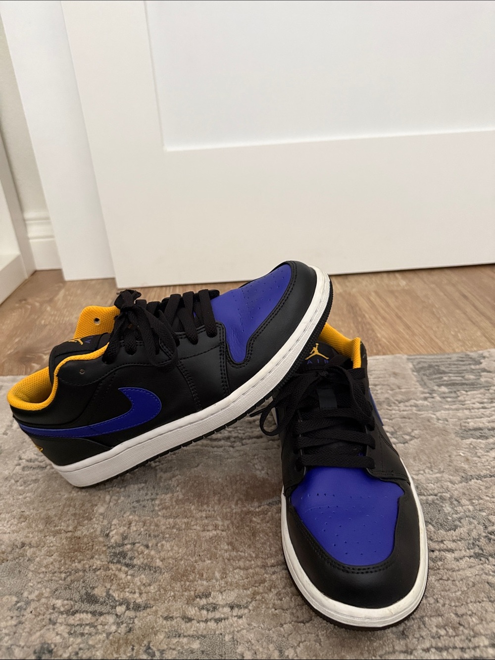 Jordan 1 Low-Top Sneakers in Black, Royal Blue & Yellow